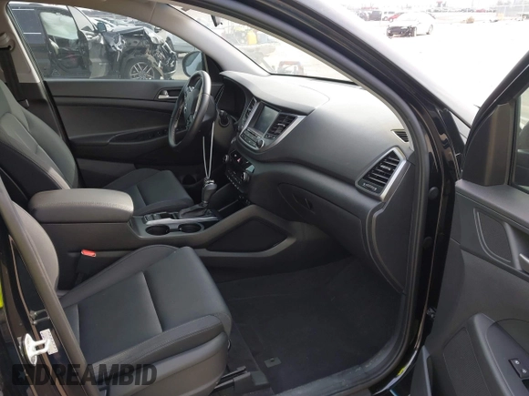 2018 Hyundai Tucson Sport with VIN KM8J33AL7JU772152, listed as a IAAI auction lot 41285203 with 87,188 mi miles. Bid and sale history available at carsss.com. Image 5.