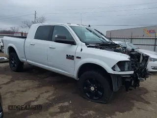 2018 Ram 2500 Laramie with VIN 3C6UR5NJ4JG328211, listed as a IAAI auction lot 41690078 with 97,265 mi miles and . Bid and sale history available at DreamBid. Image 1.