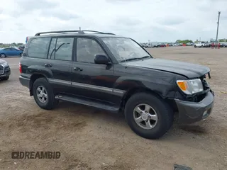 2001 Toyota Land Cruiser z VIN JTEHT05J812001099, wystawiony jako IAAI lot #42057630 z przebiegiem Nie podano mil oraz . Historia ofert i sprzedaży dostępna na DreamBid. Obrazek 1.