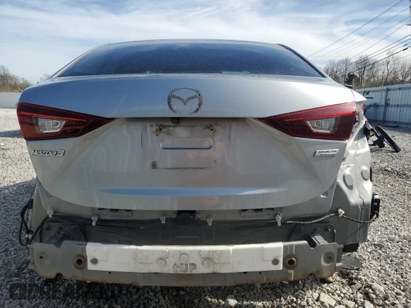 2016 Mazda 3 i Sport with VIN JM1BM1U76G1328540, listed as a Copart auction lot 50189785 with 134,642 mi miles and Salvage Title. Bid and sale history available at DreamBid. Image 6.