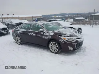 2014 Toyota Avalon Limited with VIN 4T1BK1EB1EU106004, listed as a IAAI auction lot 41341771 with 86,608 mi miles and . Bid and sale history available at DreamBid. Image 1.