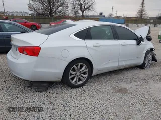 2018 Chevrolet Impala LT z VIN 1G1105S36JU133129, wystawiony jako IAAI lot #41078651 z przebiegiem 100 986 mil mil oraz . Historia ofert i sprzedaży dostępna na DreamBid. Obrazek 4.