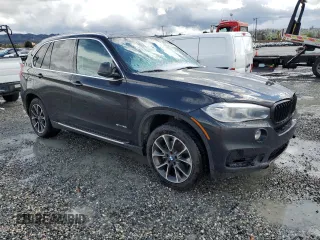 2014 BMW X5 sDrive35i with VIN 5UXKR2C50E0C01813, listed as a Copart auction lot 48896815 with 291,498 mi miles and Salvage Title. Bid and sale history available at carsss.com. Image 4.