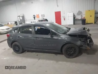 2018 Subaru Impreza with VIN 4S3GTAA65J3713216, listed as a IAAI auction lot 40963294 with 94,176 mi miles and . Bid and sale history available at DreamBid. Image 13.