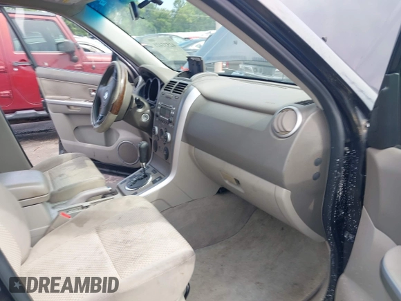 2011 Suzuki Grand Vitara Premium with VIN JS3TE0D22B4100074, listed as a IAAI auction lot 42532421 with 170,451 mi miles and . Bid and sale history available at DreamBid. Image 5.