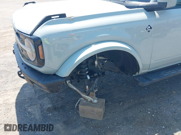 2022 Ford Bronco z VIN 1FMEE5DP3NLA80097, wystawiony jako IAAI lot #42461114 z przebiegiem 32 406 mil mil oraz . Historia ofert i sprzedaży dostępna na DreamBid. Obrazek 6.