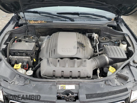 2015 Jeep Grand Cherokee Overland with VIN 1C4RJFCT2FC762573, listed as a Copart auction lot 59123275 with 229,128 mi miles and Salvage title. Bid and sale history available at DreamBid. Image 11.
