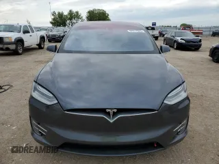 2016 Tesla Model X 70D z VIN 5YJXCAE29GF006512, wystawiony jako Copart lot #57517885 z przebiegiem Nie podano mil oraz Szkoda całkowita • Salvage title. Historia ofert i sprzedaży dostępna na DreamBid. Obrazek 5.