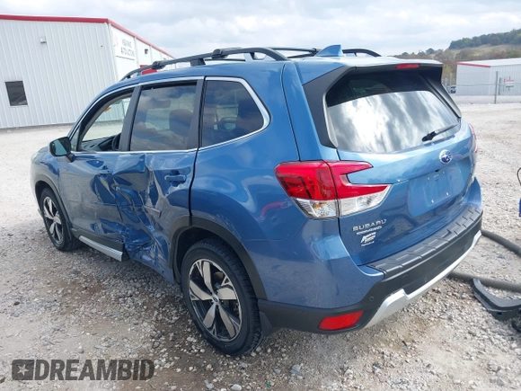 2020 Subaru Forester Touring with VIN JF2SKAXCXLH433924, listed as a IAAI auction lot 40693779 with 36,870 mi miles. Bid and sale history available at carsss.com. Image 3.