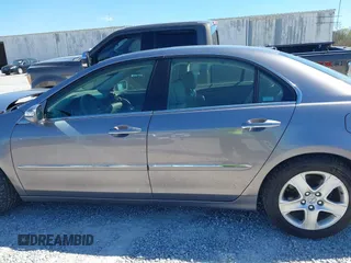 2007 Acura RL Tech Pkg with VIN JH4KB16647C002703, listed as a IAAI auction lot 41882614 with 174,713 mi miles. Bid and sale history available at carsss.com. Image 14.
