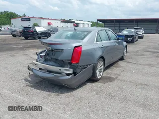 2019 Cadillac CTS Luxury RWD with VIN 1G6AR5SS4K0122114, listed as a IAAI auction lot 42556986 with 74,325 mi miles and . Bid and sale history available at DreamBid. Image 4.