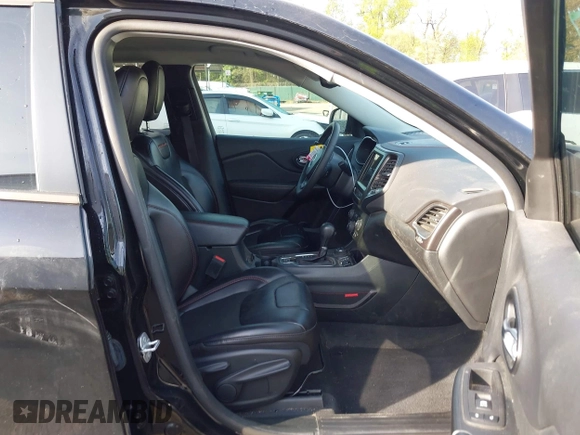 2022 Jeep Cherokee Trailhawk with VIN 1C4PJMBX1ND533715, listed as a IAAI auction lot 42041057 with 65,487 mi miles and . Bid and sale history available at DreamBid. Image 5.