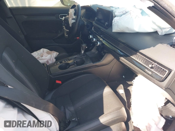 2023 Honda Civic Sport with VIN 2HGFE2F54PH512362, listed as a IAAI auction lot 41401479 with 12,672 mi miles and . Bid and sale history available at DreamBid. Image 5.