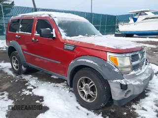 2008 Dodge Nitro SXT with VIN 1D8GU28K58W188643, listed as a IAAI auction lot 41568410 with 0 mi miles. Bid and sale history available at carsss.com. Image 1.