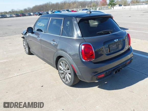 2015 MINI Hardtop 4 Door S with VIN WMWXU3C57FT892179, listed as a IAAI auction lot 42092010 with 95,156 mi miles and . Bid and sale history available at DreamBid. Image 3.