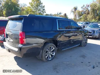 2017 Chevrolet Suburban Premier with VIN 1GNSKJKC7HR281583, listed as a IAAI auction lot 40680315 with 69,192 mi miles. Bid and sale history available at carsss.com. Image 4.