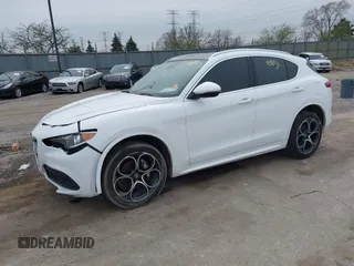 2020 Alfa Romeo Stelvio Ti z VIN ZASPAKBN6L7C92398, wystawiony jako IAAI lot #41924883 z przebiegiem 73 683 mil mil oraz . Historia ofert i sprzedaży dostępna na DreamBid. Obrazek 2.