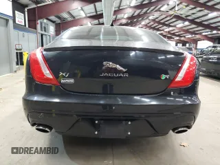 2016 Jaguar XJ R-Sport z VIN SAJWJ1CD0G8V98860, wystawiony jako Copart lot #79899934 z przebiegiem 72 410 mil mil oraz Czysty tytuł • Clean title. Historia ofert i sprzedaży dostępna na DreamBid. Obrazek 6.