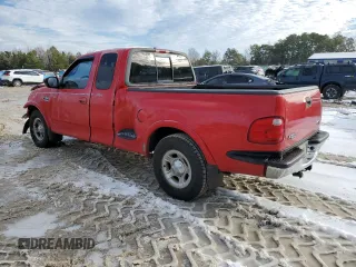 2001 Ford F-150 XL with VIN 1FTRX07W31KE64015, listed as a Copart auction lot 89297905 with 198,881 mi miles and Salvage Title. Bid and sale history available at carsss.com. Image 2.