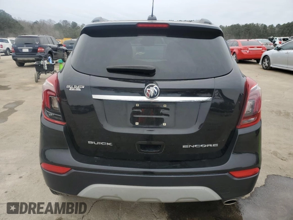 2017 Buick Encore Essence with VIN KL4CJCSBXHB099706, listed as a Copart auction lot 89332975 with 98,045 mi miles and Salvage Title. Bid and sale history available at DreamBid. Image 6.