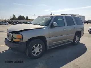 2002 GMC Yukon Denali z VIN 1GKEK63U72J297223, wystawiony jako Copart lot #59995125 z przebiegiem 287 876 mil mil oraz Szkoda całkowita • Salvage title. Historia ofert i sprzedaży dostępna na DreamBid. Obrazek 1.