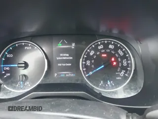 2021 Toyota RAV4 Hybrid XLE with VIN JTMRWRFVXMD127527, listed as a IAAI auction lot 41568988 with 66,358 mi miles. Bid and sale history available at carsss.com. Image 7.