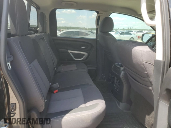 2021 Nissan Titan SV z VIN 1N6AA1EF6MN512596, wystawiony jako Copart lot #56140285 z przebiegiem 49 145 mil mil oraz Szkoda całkowita • Salvage title. Historia ofert i sprzedaży dostępna na DreamBid. Obrazek 10.