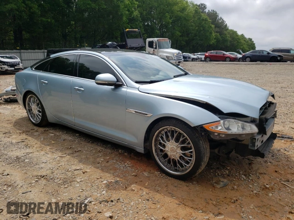2013 Jaguar XJ with VIN SAJWA1C77D8V41738, listed as a Copart auction lot 53796225 with 104,063 mi miles and Salvage Title. Bid and sale history available at DreamBid. Image 4.