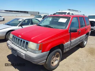 1996 Jeep Grand Cherokee Laredo z VIN 1J4GZ58Y5TC183677, wystawiony jako IAAI lot #42582989 z przebiegiem 187 453 mil mil oraz . Historia ofert i sprzedaży dostępna na DreamBid. Obrazek 2.