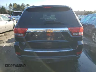 2013 Jeep Grand Cherokee Overland with VIN 1C4RJFCTXDC525097, listed as a Copart auction lot 42250875 with 214,368 mi miles and Salvage Title. Bid and sale history available at carsss.com. Image 6.