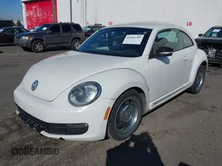 2012 Volkswagen Beetle 2.5L PZEV with VIN 3VWHP7AT6CM622309, listed as a IAAI auction lot 41681789 with 135,155 mi miles. Bid and sale history available at carsss.com. Image 2.
