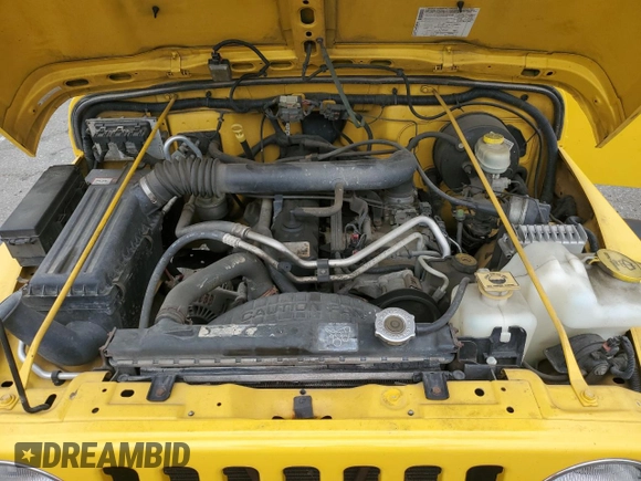 2004 Jeep Wrangler Rubicon with VIN 1J4FA69SX4P768963, listed as a Copart auction lot 56999665 with 91,949 mi miles and Salvage title. Bid and sale history available at DreamBid. Image 11.