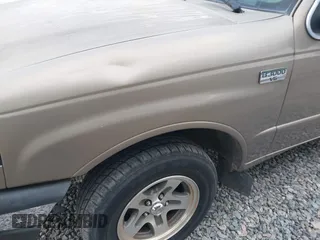 2003 Mazda B-Series 2WD Truck SE with VIN 4F4YR46VX3TM16294, listed as a IAAI auction lot 42034107 with 165,007 mi miles. Bid and sale history available at carsss.com. Image 14.