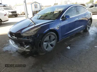 2020 Tesla Model 3 Standard Range Plus with VIN 5YJ3E1EA7LF705907, listed as a Copart auction lot 48765145 with 104,479 mi miles and Salvage Title. Bid and sale history available at DreamBid. Image 1.
