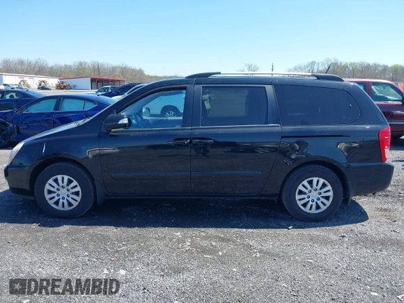 2014 Kia Sedona LX with VIN KNDMG4C71E6579260, listed as a IAAI auction lot 41985403 with 93,523 mi miles. Bid and sale history available at carsss.com. Image 14.