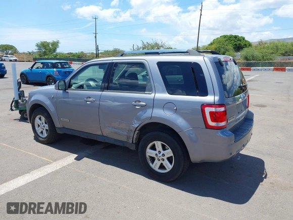 2008 Ford Escape Hybrid z VIN 1FMCU49HX8KC68082, wystawiony jako IAAI lot #42806471 z przebiegiem 104 848 mil mil oraz . Historia ofert i sprzedaży dostępna na DreamBid. Obrazek 6.