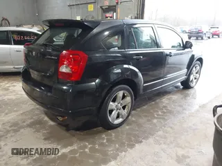 2011 Dodge Caliber Rush with VIN 1B3CB8HB5BD108767, listed as a IAAI auction lot 41820107 with 145,101 mi miles. Bid and sale history available at carsss.com. Image 4.