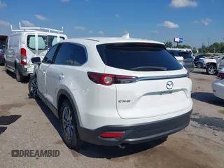 2019 Mazda CX-9 Touring with VIN JM3TCACY7K0314539, listed as a IAAI auction lot 42234361 with 98,299 mi miles and . Bid and sale history available at DreamBid. Image 3.