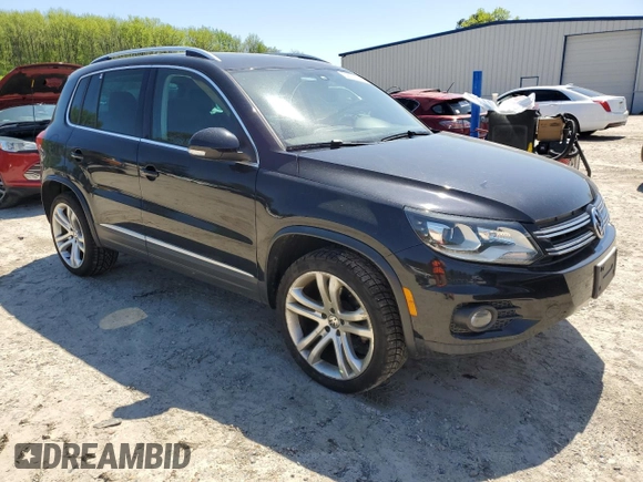2012 Volkswagen Tiguan SEL with VIN WVGAV7AX2CW538660, listed as a Copart auction lot 52070165 with 111,673 mi miles and Clean Title. Bid and sale history available at DreamBid. Image 4.