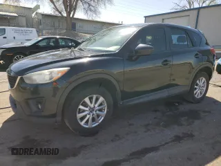 2015 Mazda CX-5 Touring with VIN JM3KE4CY3F0435422, listed as a Copart auction lot 51835575 with 185,727 mi miles and Salvage Title. Bid and sale history available at DreamBid. Image 1.
