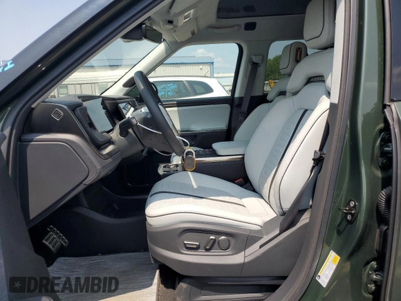 2022 Rivian R1T Adventure z VIN 7FCTGAAA5NN013983, wystawiony jako Copart lot #68013724 z przebiegiem 9 006 mil mil oraz Szkoda całkowita • Salvage title. Historia ofert i sprzedaży dostępna na DreamBid. Obrazek 7.