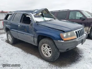 2002 Jeep Grand Cherokee Laredo with VIN 1J4GW48S62C109360, listed as a IAAI auction lot 41466959 with 142,148 mi miles. Bid and sale history available at carsss.com. Image 1.