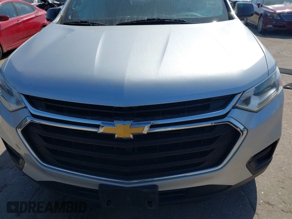2018 Chevrolet Traverse LS z VIN 1GNERFKWXJJ120682, wystawiony jako IAAI lot #42007628 z przebiegiem 112 795 mil mil oraz . Historia ofert i sprzedaży dostępna na DreamBid. Obrazek 12.