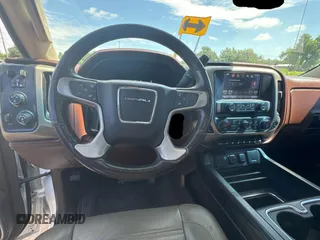 2016 GMC Sierra 2500HD Denali z VIN 1GT12UE84GF183401, wystawiony jako Copart lot #60241455 z przebiegiem 163 535 mil mil oraz Szkoda całkowita • Salvage title. Historia ofert i sprzedaży dostępna na DreamBid. Obrazek 9.