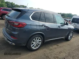 2019 BMW X5 xDrive40i with VIN 5UXCR6C57KLL11051, listed as a Copart auction lot 60268695 with 169,671 mi miles and Salvage title. Bid and sale history available at DreamBid. Image 3.