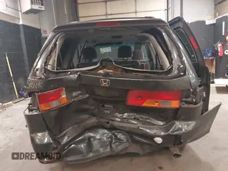 2004 Honda Odyssey EX-RES z VIN 5FNRL18814B092516, wystawiony jako IAAI lot #42108211 z przebiegiem 214 312 mil mil oraz . Historia ofert i sprzedaży dostępna na DreamBid. Obrazek 17.