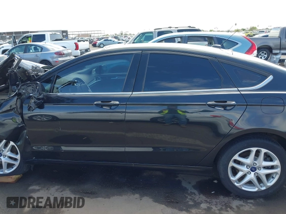 2014 Ford Fusion SE with VIN 3FA6P0H76ER356943, listed as a IAAI auction lot 42057895 with 161,213 mi miles and . Bid and sale history available at DreamBid. Image 14.