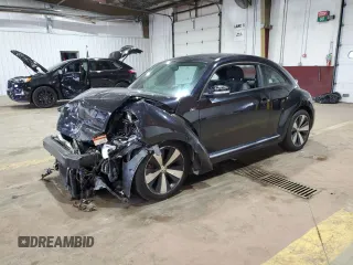 2014 Volkswagen Beetle Turbo R-Line with VIN 3VWVT7ATXEM665178, listed as a Copart auction lot 75652044 with Not Provided miles and Salvage Title. Bid and sale history available at DreamBid. Image 1.