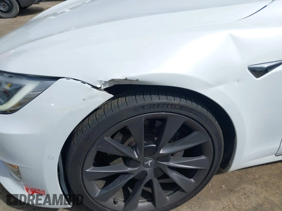 2018 Tesla Model S 75D with VIN 5YJSA1E23JF271465, listed as a IAAI auction lot 41911356 with 50,483 mi miles and . Bid and sale history available at DreamBid. Image 6.