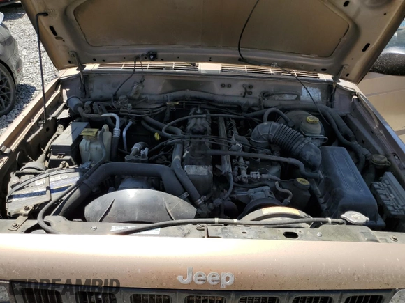 1999 Jeep Cherokee Sport z VIN 1J4FF68S7XL553295, wystawiony jako Copart lot #62390915 z przebiegiem 358 587 mil mil oraz Czysty tytuł • Clean title. Historia ofert i sprzedaży dostępna na DreamBid. Obrazek 12.